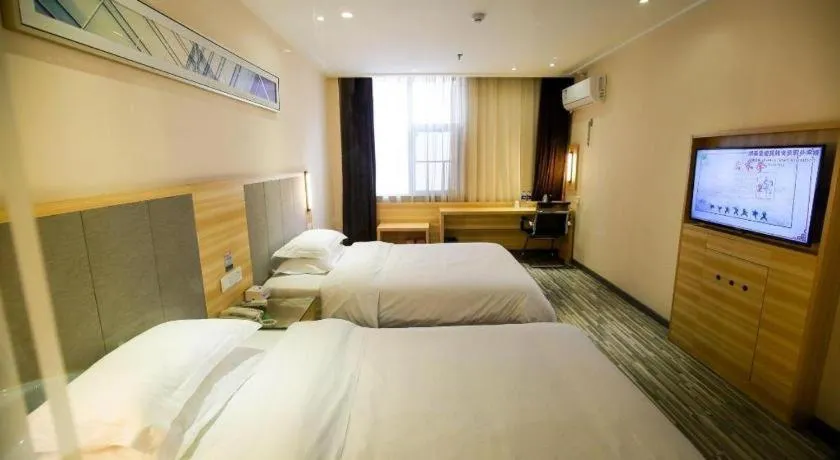 Bed in City Comfort Inn Hotel Zhangjiajie Railway Station Tianmen Mountain Cableway Station