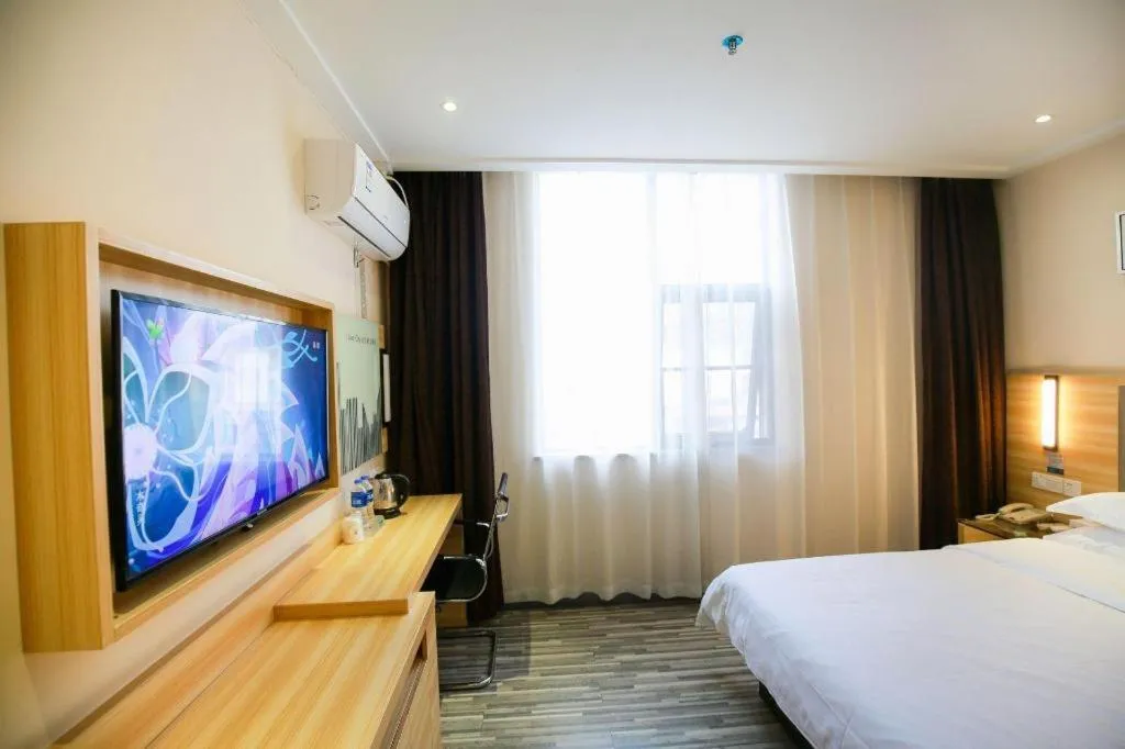 Bed in City Comfort Inn Hotel Zhangjiajie Railway Station Tianmen Mountain Cableway Station