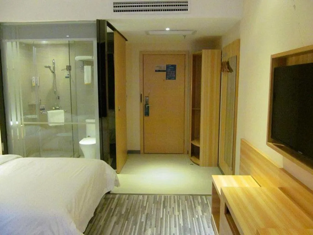 Bed in City Comfort Inn Hotel Zhangjiajie Railway Station Tianmen Mountain Cableway Station