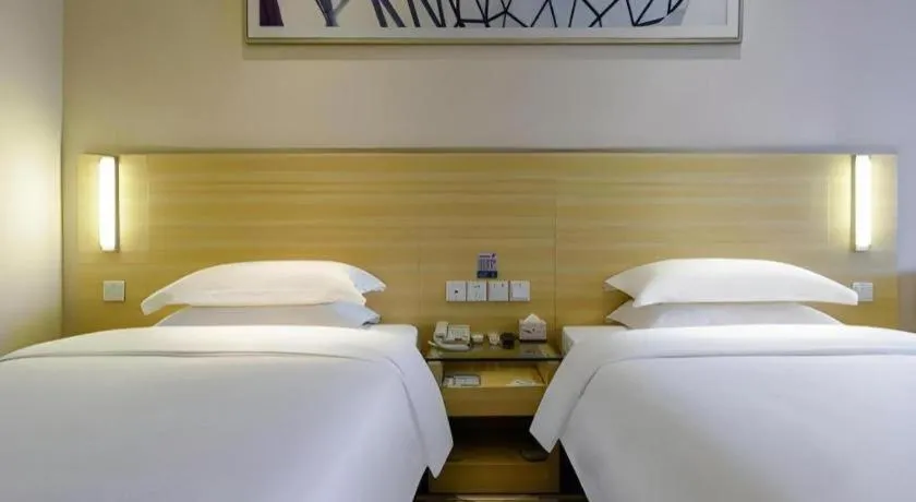 Bed in City Comfort Inn Hotel Guiyang Normal University Yangmingci Metro Station