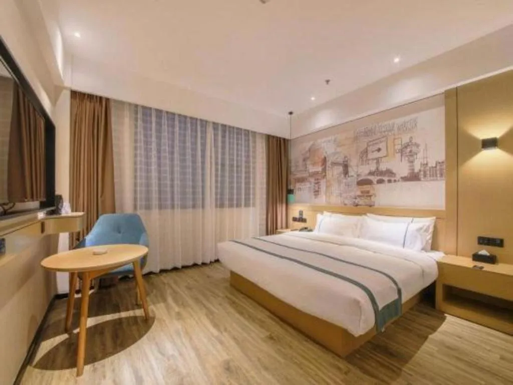 Bed in City Comfort Inn Hezhou Avenue