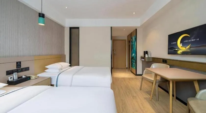 Bed in City Comfort Inn Hezhou Avenue