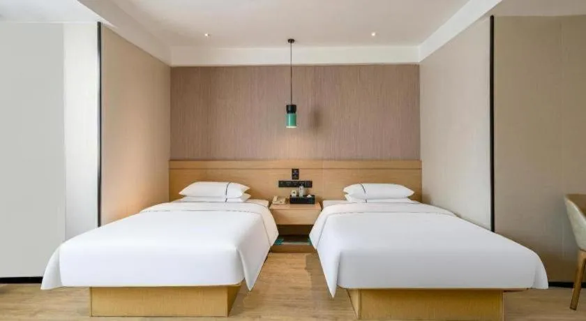 Bed in City Comfort Inn Hezhou Avenue