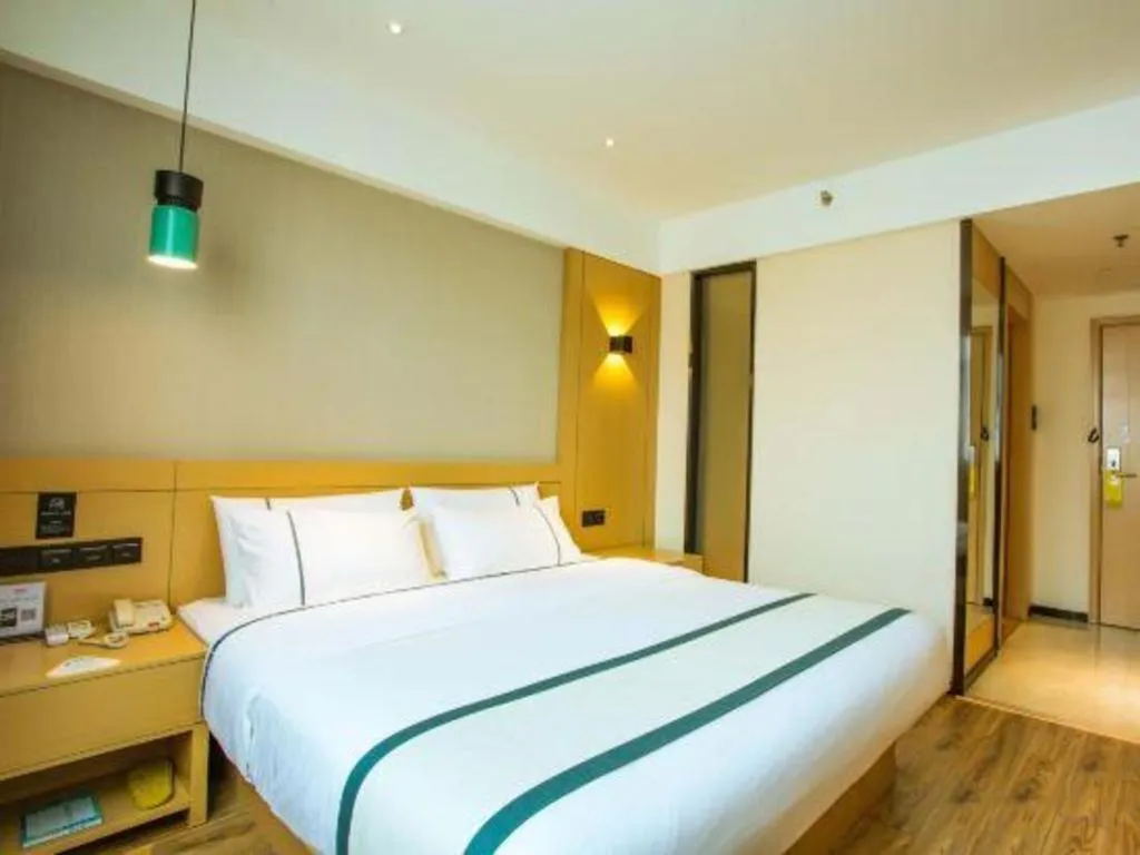 Bed in City Comfort Inn Hezhou Avenue