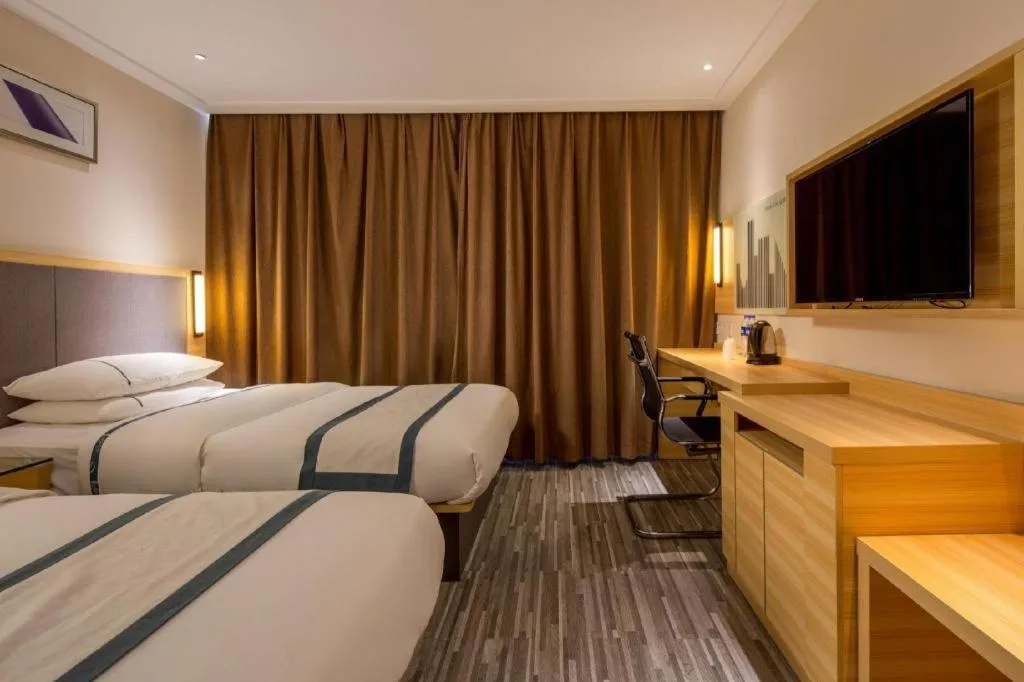 Bed in City Comfort Inn Dongguan Nancheng Tian'an Digital City