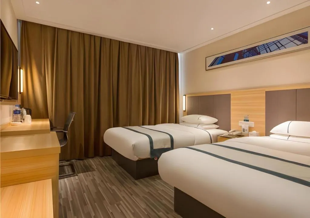 Bed in City Comfort Inn Dongguan Nancheng Tian'an Digital City