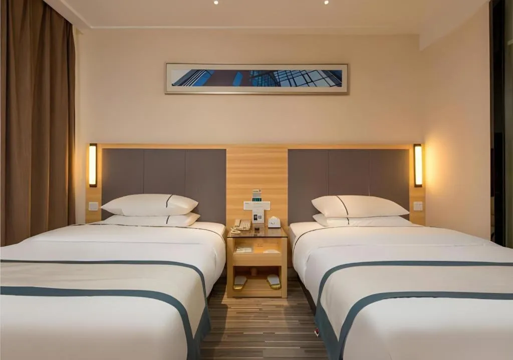 Bed in City Comfort Inn Dongguan Nancheng Tian'an Digital City