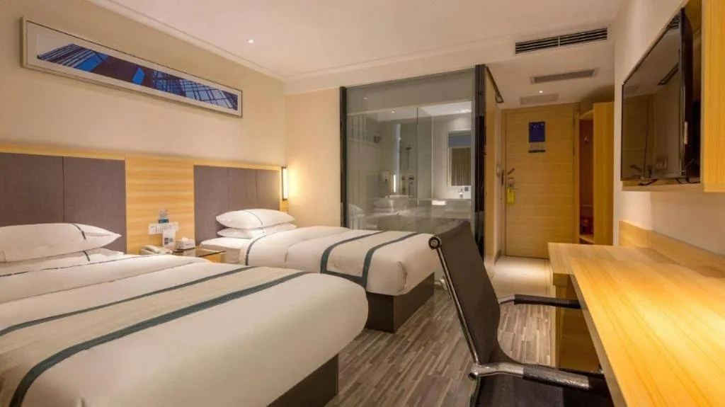 Bed in City Comfort Inn Dongguan Nancheng Tian'an Digital City