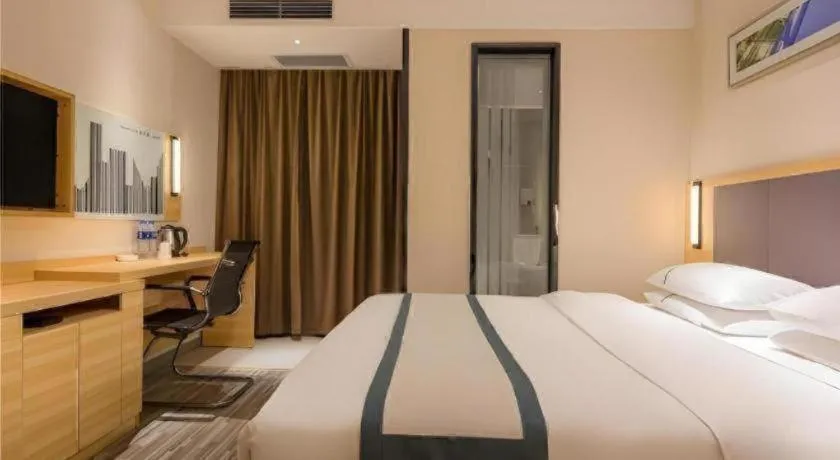 Bed in City Comfort Inn Dongguan Nancheng Tian'an Digital City