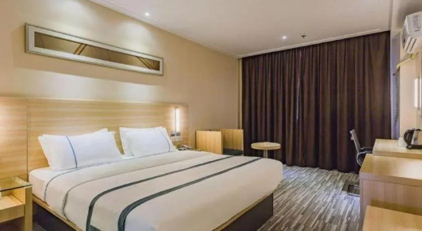 Bed in City Comfort Inn Dongguan Nancheng Tian'an Digital City