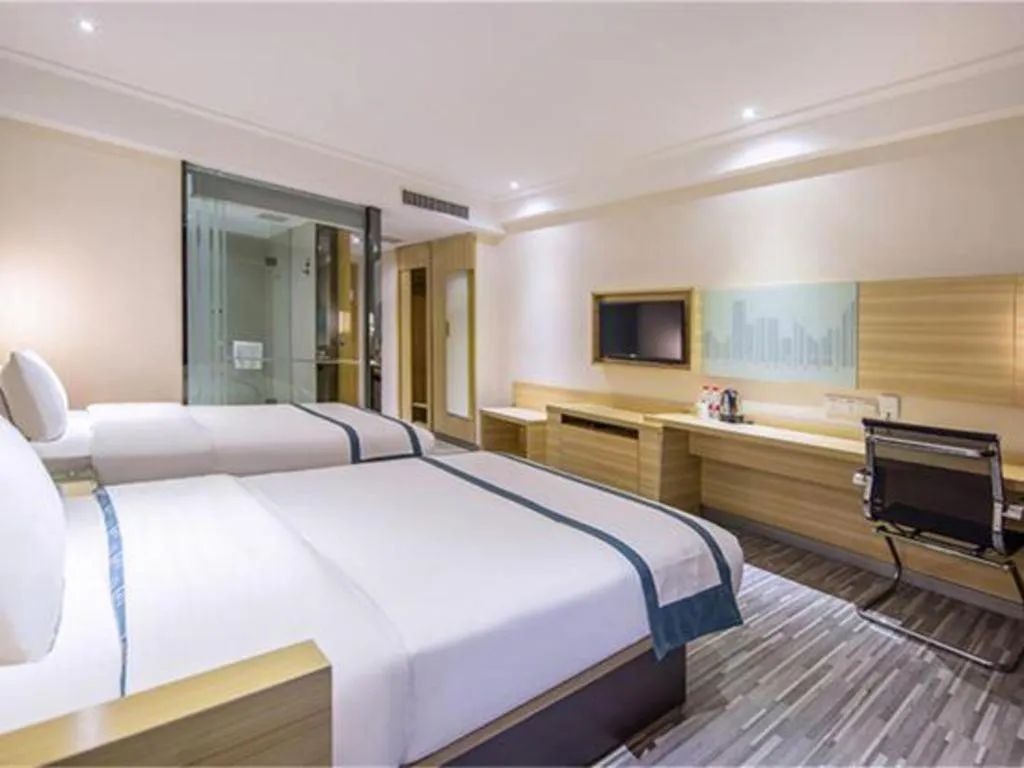 Bed in City Comfort Inn Maoming High Speed Railway Station Wenming Road