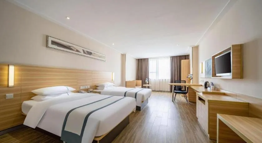 Bed in City Comfort Inn Maoming High Speed Railway Station Wenming Road
