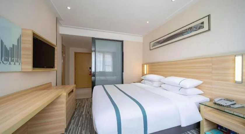 Bed in City Comfort Inn Maoming High Speed Railway Station Wenming Road
