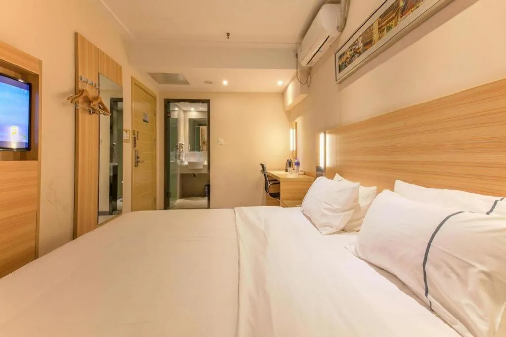 Bed in City Comfort Inn Wuhan Rui'an Street Metro Station