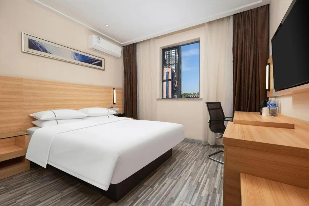 Bed in City Comfort Inn Wuhan Rui'an Street Metro Station