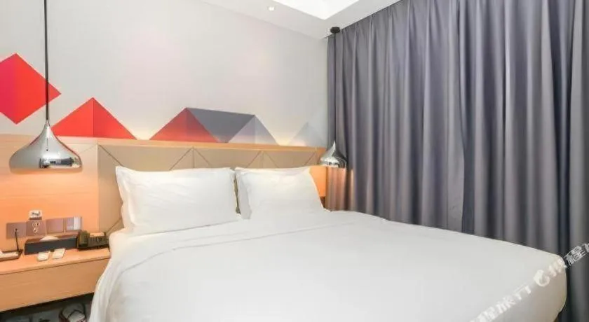 Bed in Borrman Hotel Zhuhai Gongbei Port Fuhuali Light Rail