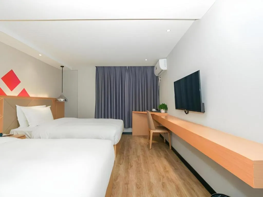 Bed in Borrman Hotel Zhuhai Gongbei Port Fuhuali Light Rail