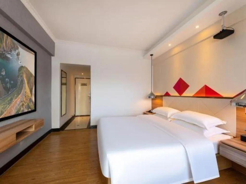 Bed in Borrman Hotel Zhuhai Gongbei Port Fuhuali Light Rail
