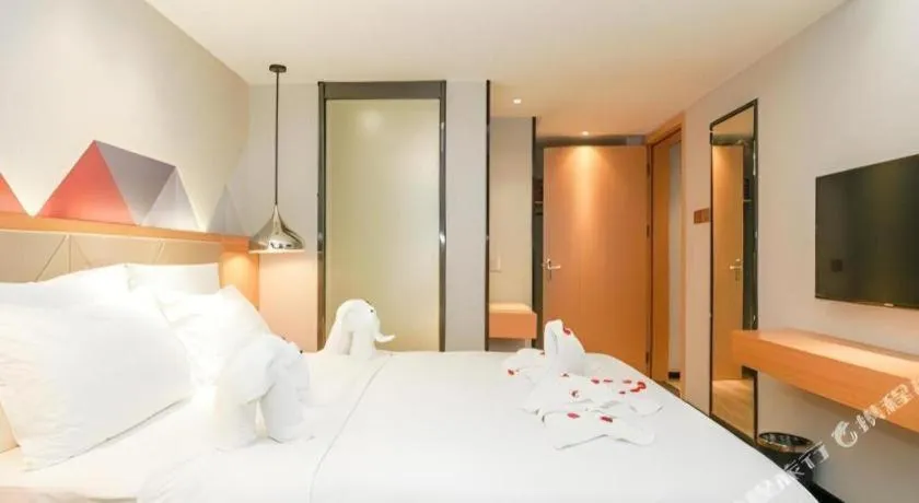 Bed in Borrman Hotel Zhuhai Gongbei Port Fuhuali Light Rail