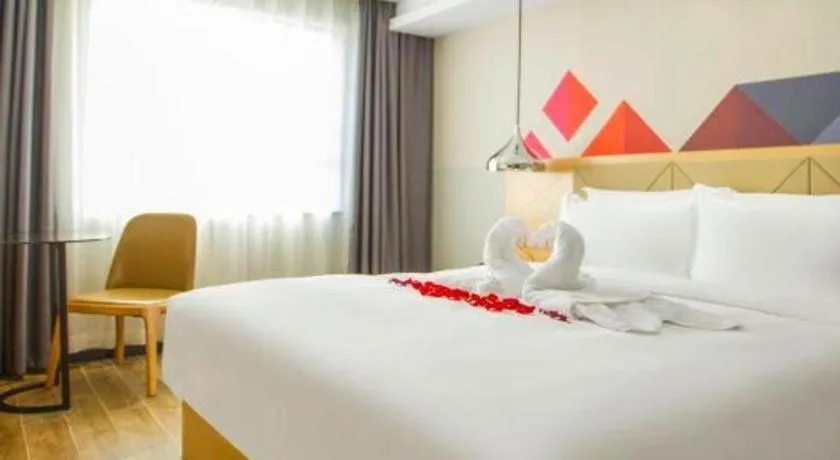 Bed in Borrman Hotel Zhuhai Gongbei Port Fuhuali Light Rail