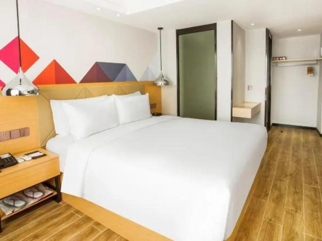 Bed in Borrman Hotel Zhuhai Gongbei Port Fuhuali Light Rail