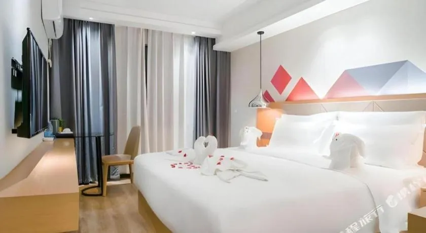 Bed in Borrman Hotel Zhuhai Gongbei Port Fuhuali Light Rail