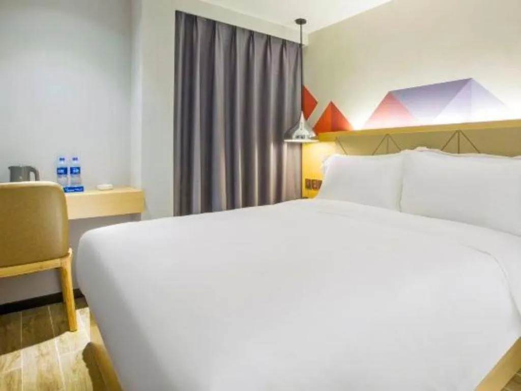 Bed in Borrman Hotel Zhuhai Gongbei Port Fuhuali Light Rail