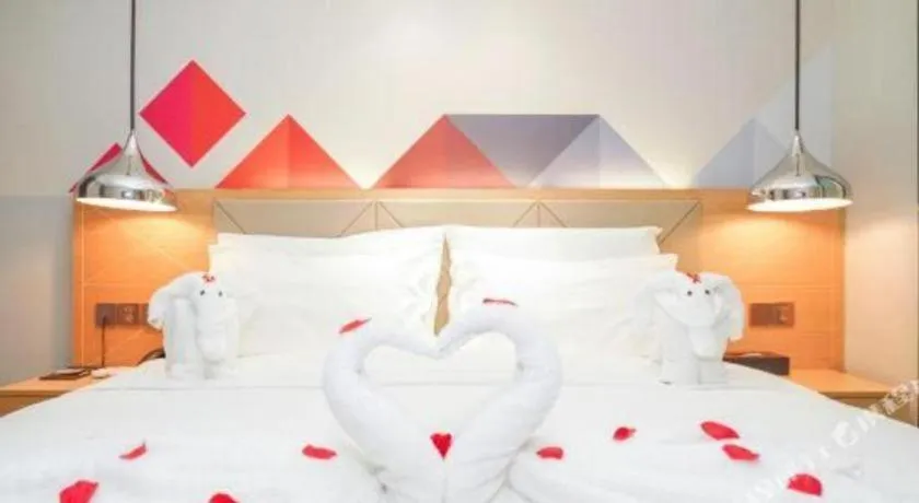 Bed in Borrman Hotel Zhuhai Gongbei Port Fuhuali Light Rail