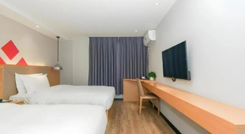 Bed in Borrman Hotel Zhuhai Gongbei Port Fuhuali Light Rail