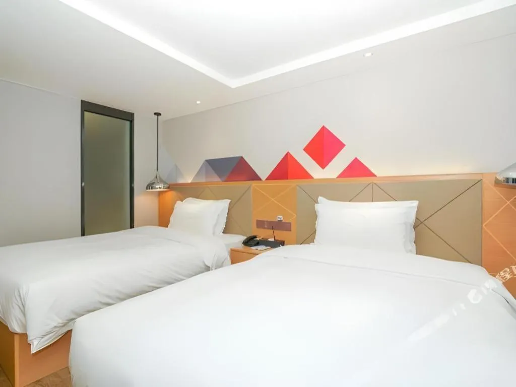 Bed in Borrman Hotel Zhuhai Gongbei Port Fuhuali Light Rail
