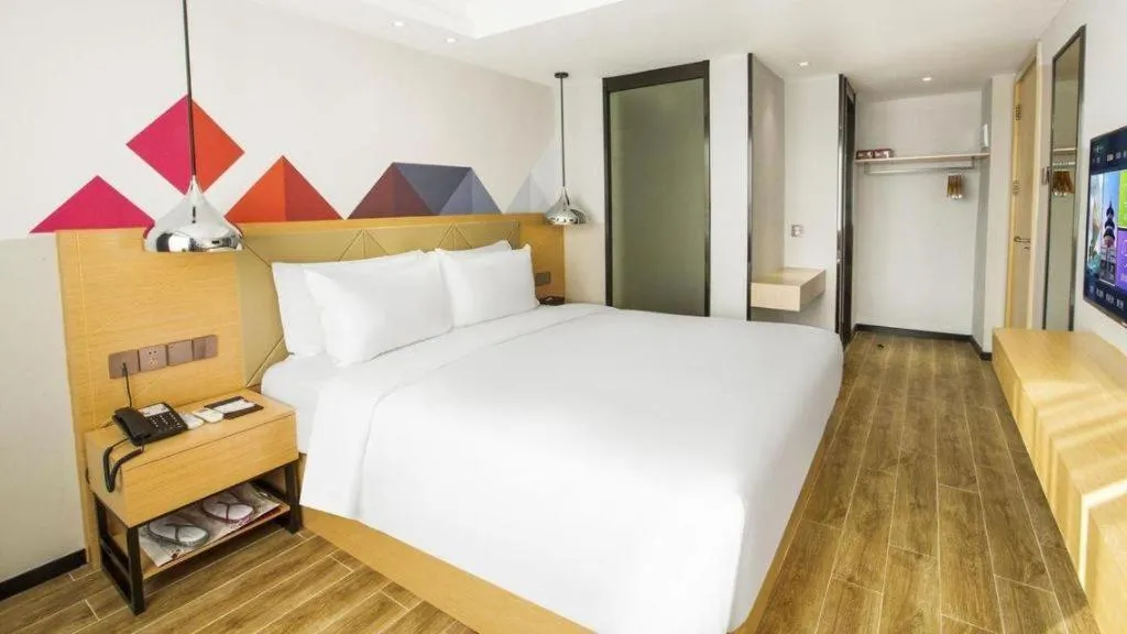 Bed in Borrman Hotel Zhuhai Gongbei Port Fuhuali Light Rail