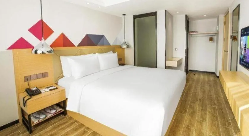 Bed in Borrman Hotel Zhuhai Gongbei Port Fuhuali Light Rail