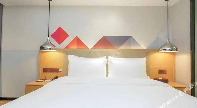 Bed in Borrman Hotel Zhuhai Gongbei Port Fuhuali Light Rail