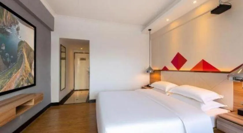 Bed in Borrman Hotel Zhuhai Gongbei Port Fuhuali Light Rail