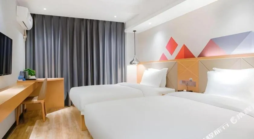 Bed in Borrman Hotel Zhuhai Gongbei Port Fuhuali Light Rail