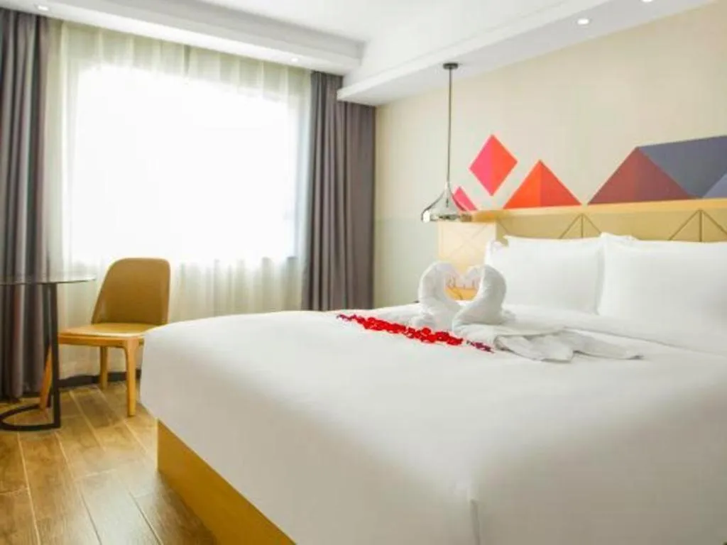 Bed in Borrman Hotel Zhuhai Gongbei Port Fuhuali Light Rail