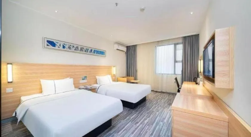 Bed in City Comfort Inn Qianjiang Longxiacheng