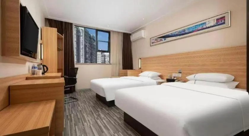 Bed in City Comfort Inn Qianjiang Longxiacheng