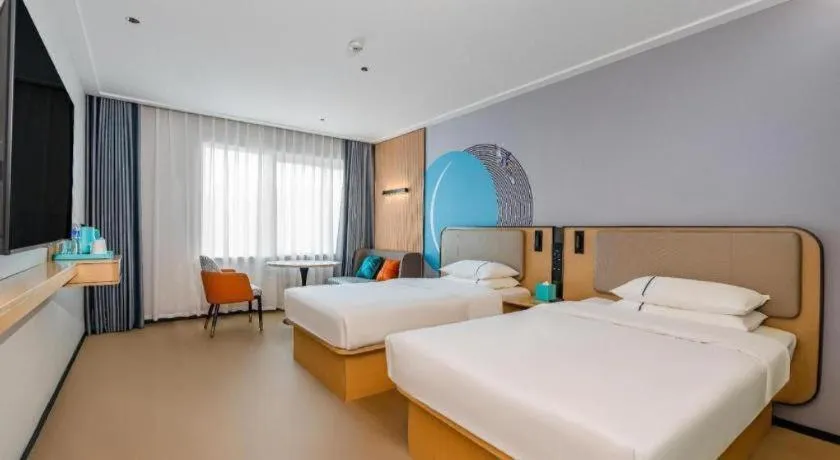 Bed in City Comfort Inn Qianjiang Longxiacheng