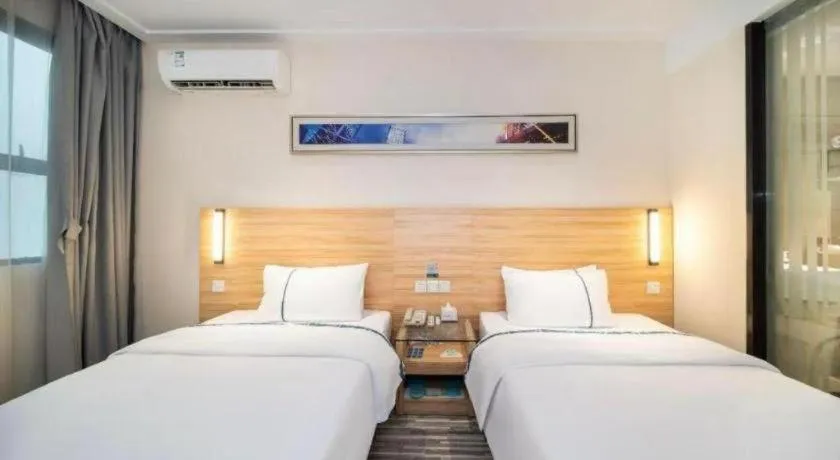 Bed in City Comfort Inn Qianjiang Longxiacheng