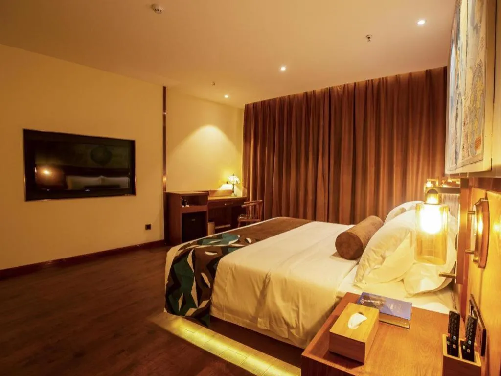 Bed in James Joyce Coffetel· Yinchuan International Exhibition Center Wanda Square Qinshui Street