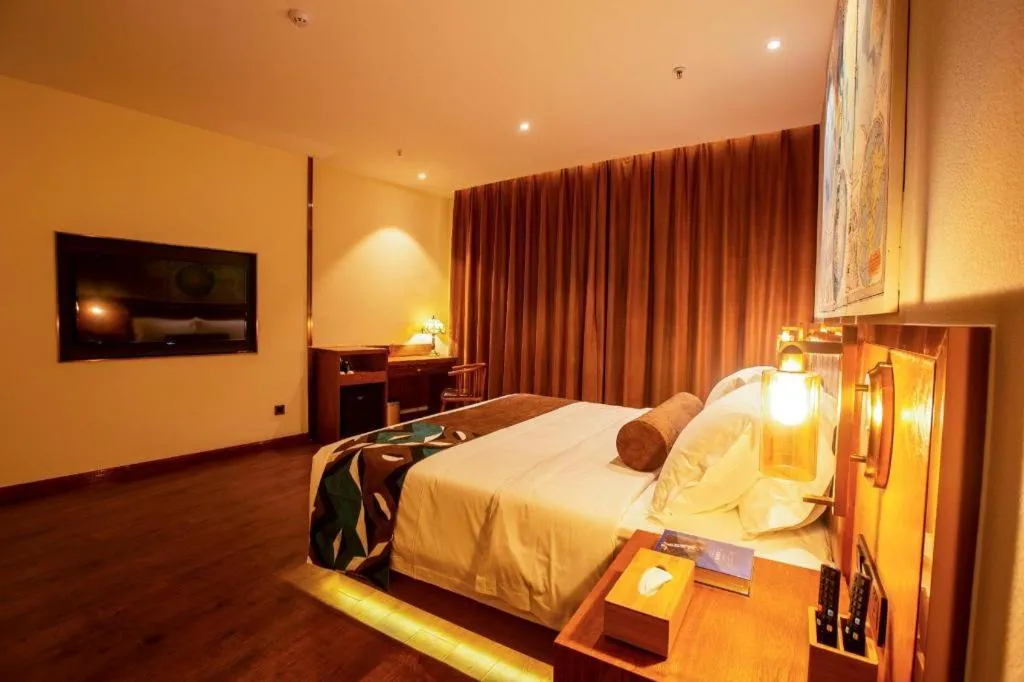 Bed in James Joyce Coffetel· Yinchuan International Exhibition Center Wanda Square Qinshui Street