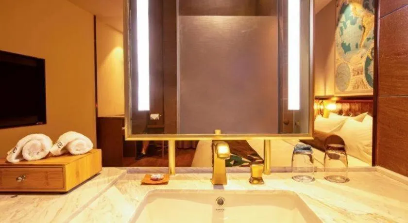 Bed in James Joyce Coffetel· Yinchuan International Exhibition Center Wanda Square Qinshui Street