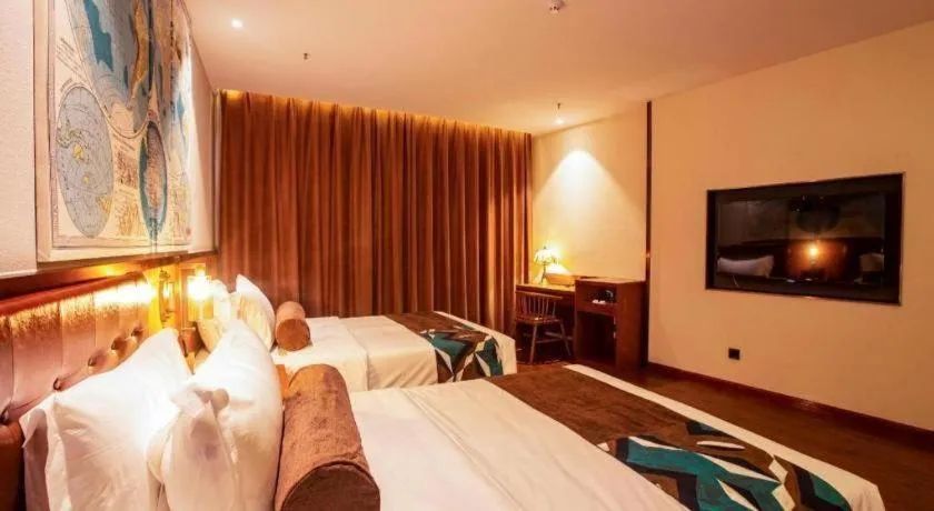 Bed in James Joyce Coffetel· Yinchuan International Exhibition Center Wanda Square Qinshui Street