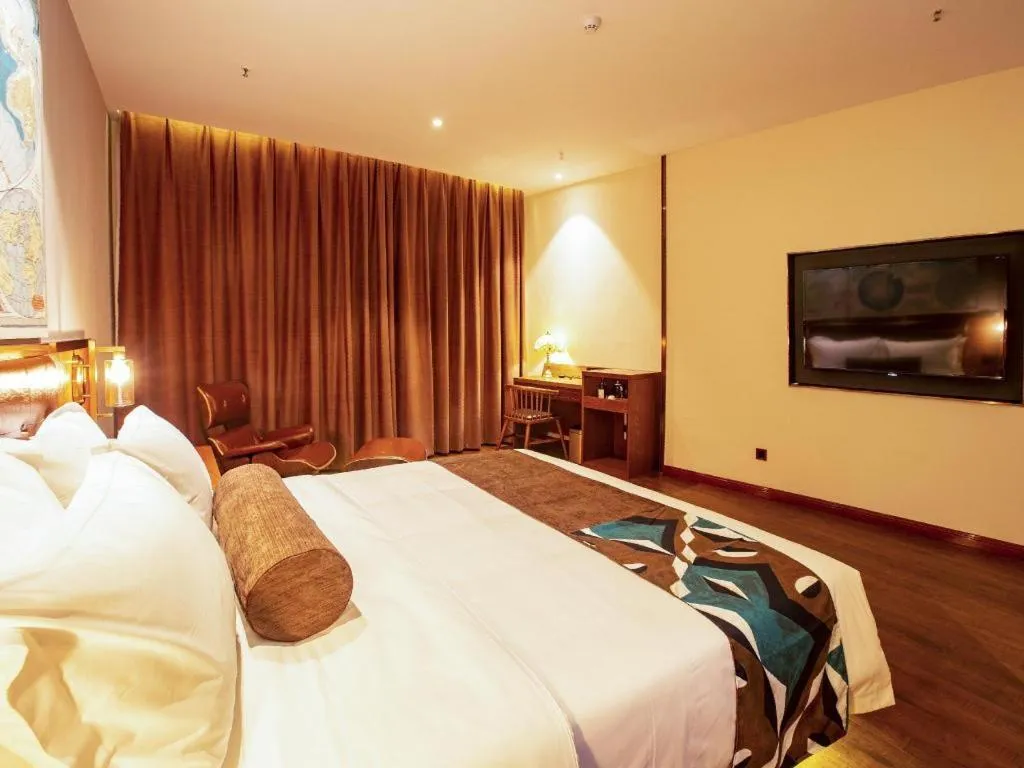 Bed in James Joyce Coffetel· Yinchuan International Exhibition Center Wanda Square Qinshui Street