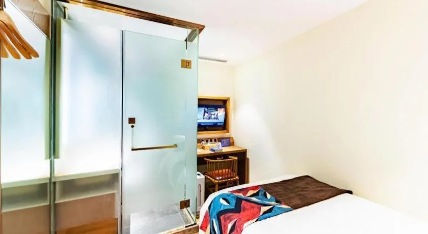 Bed in James Joyce Coffetel Beijing Station