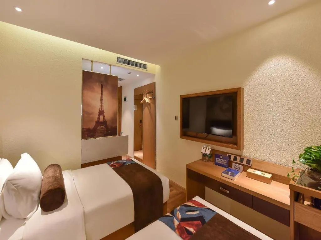 Bed in James Joyce Coffetel Beijing Station