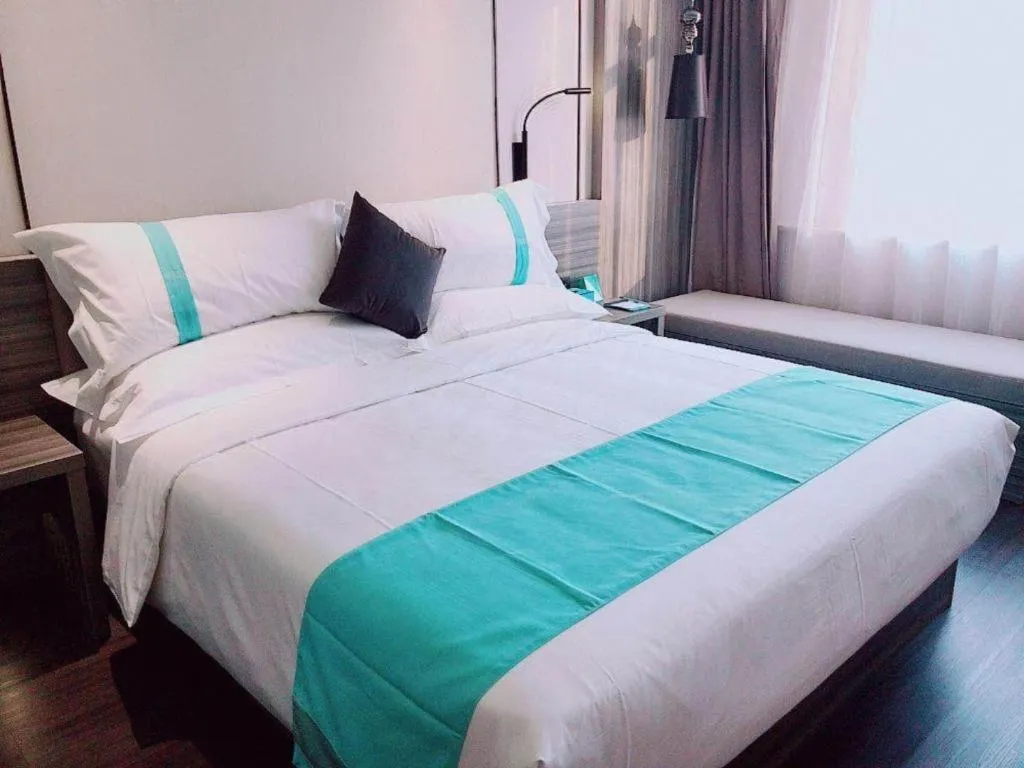 Bed in Xana Hotelle· Dalian Software Park University of Technology