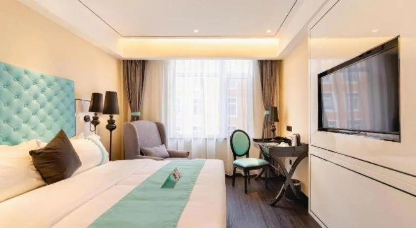 Bed in Xana Hotelle· Dalian Software Park University of Technology