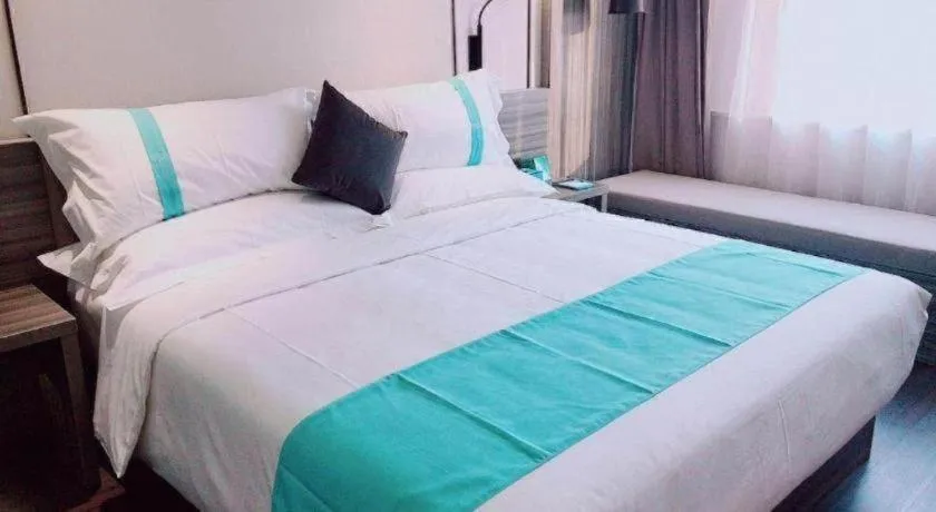 Bed in Xana Hotelle· Dalian Software Park University of Technology